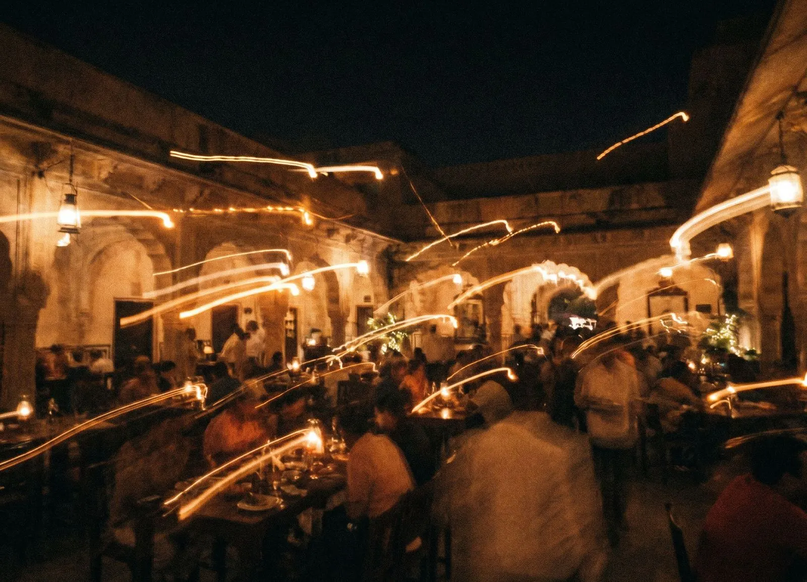 Motion-blurred crowd in a bar